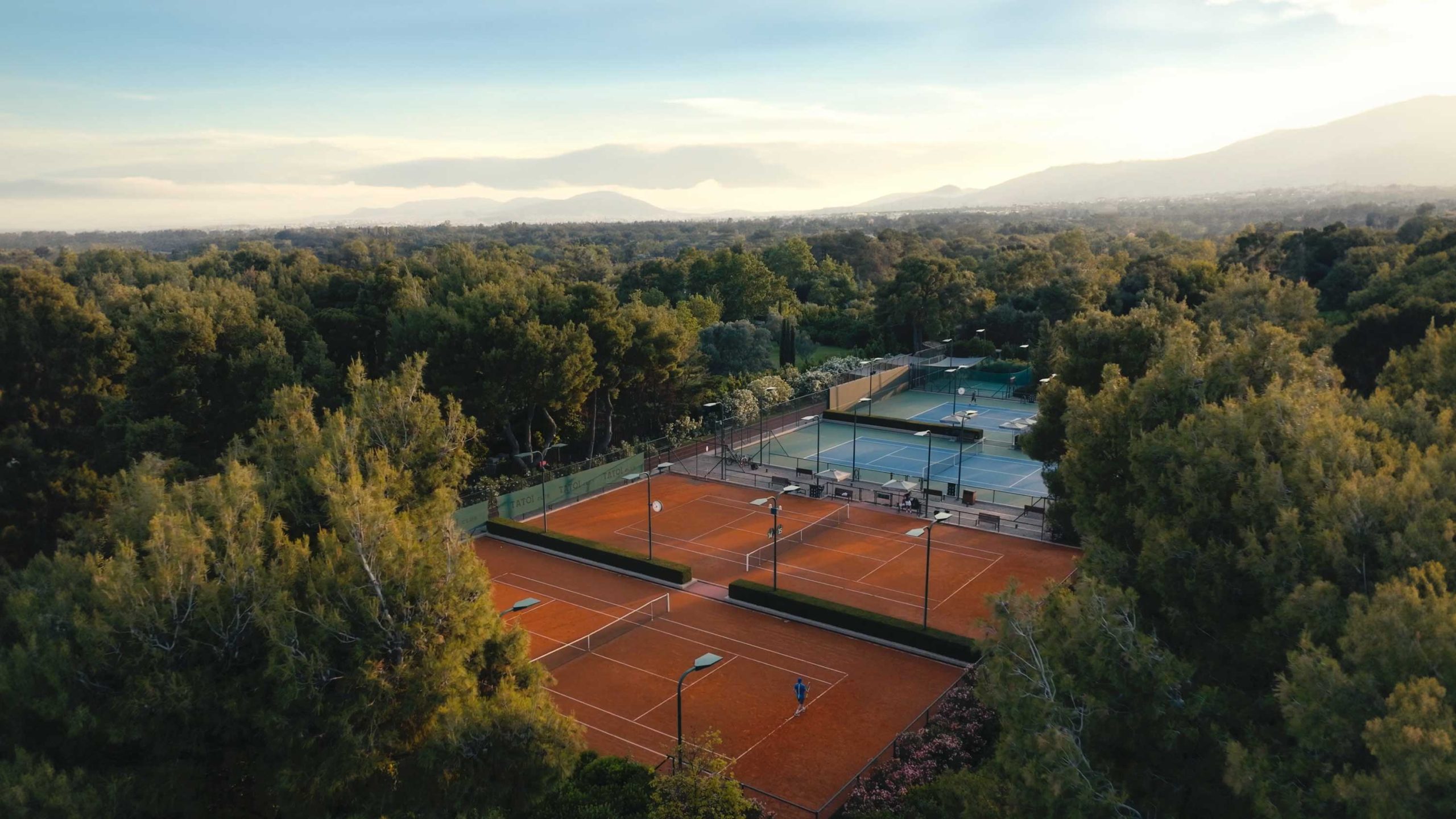 Aerial view of the clay courts within the grounds of TATOÏ Club